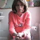 A blonde, pregnant, Australian girl tells us how bad she has to poop, sits down on a toilet, and starts shitting immediately with hard, multiple plops that get progressively heavier. Some pissing as well. Presented in 720P HD. About 5 minutes.